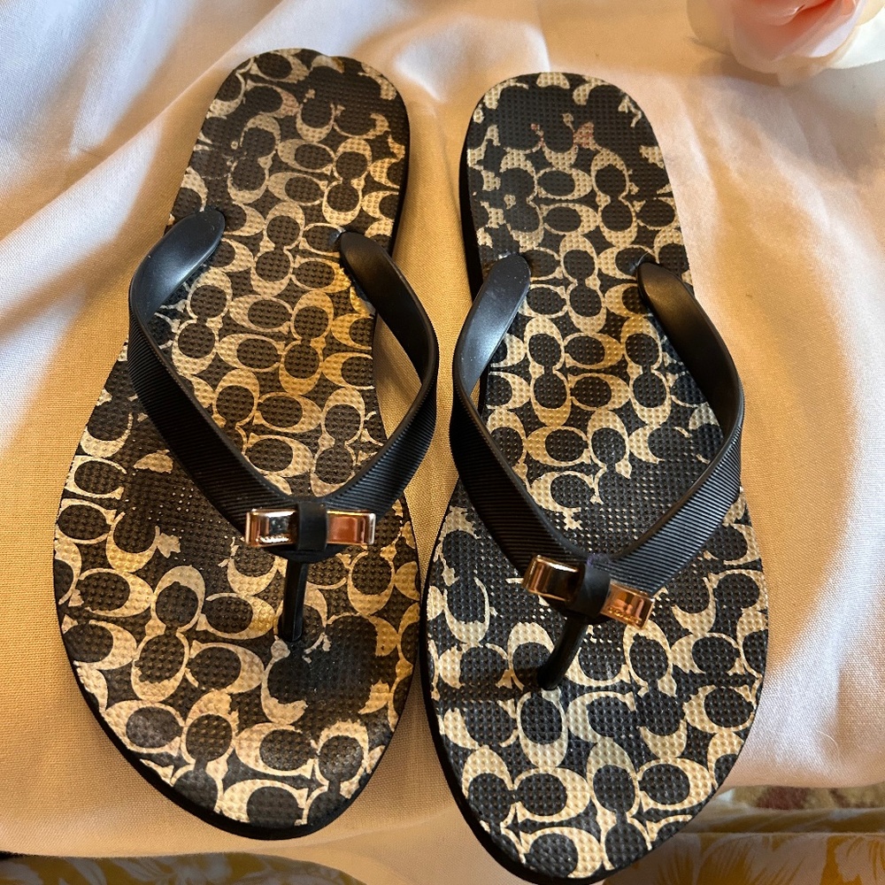 Coach sandals flip flops … well loved but lots of wear still size 7